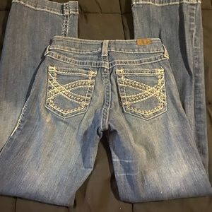 27/34 ariat dark wash trousers.